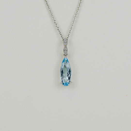 9ct White Gold 1.90ct Elongated Pear Cut Blue Topaz and Diamond Pendant