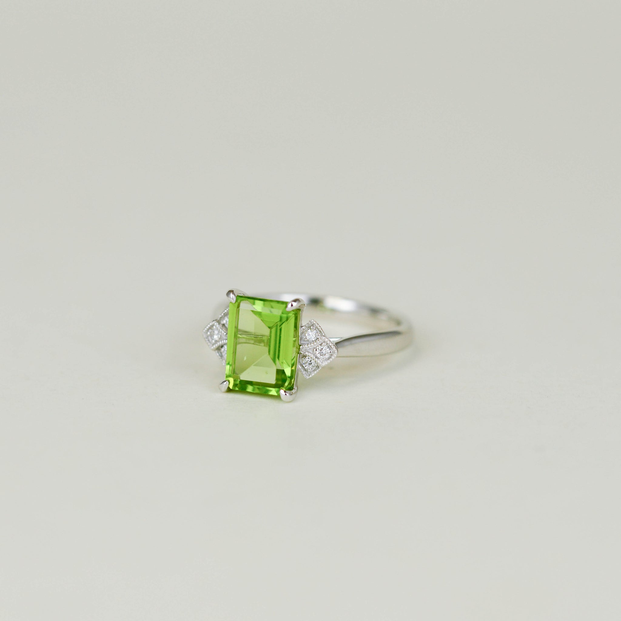 9ct White Gold 2.35ct Emerald Cut Peridot and Diamond Dress Ring