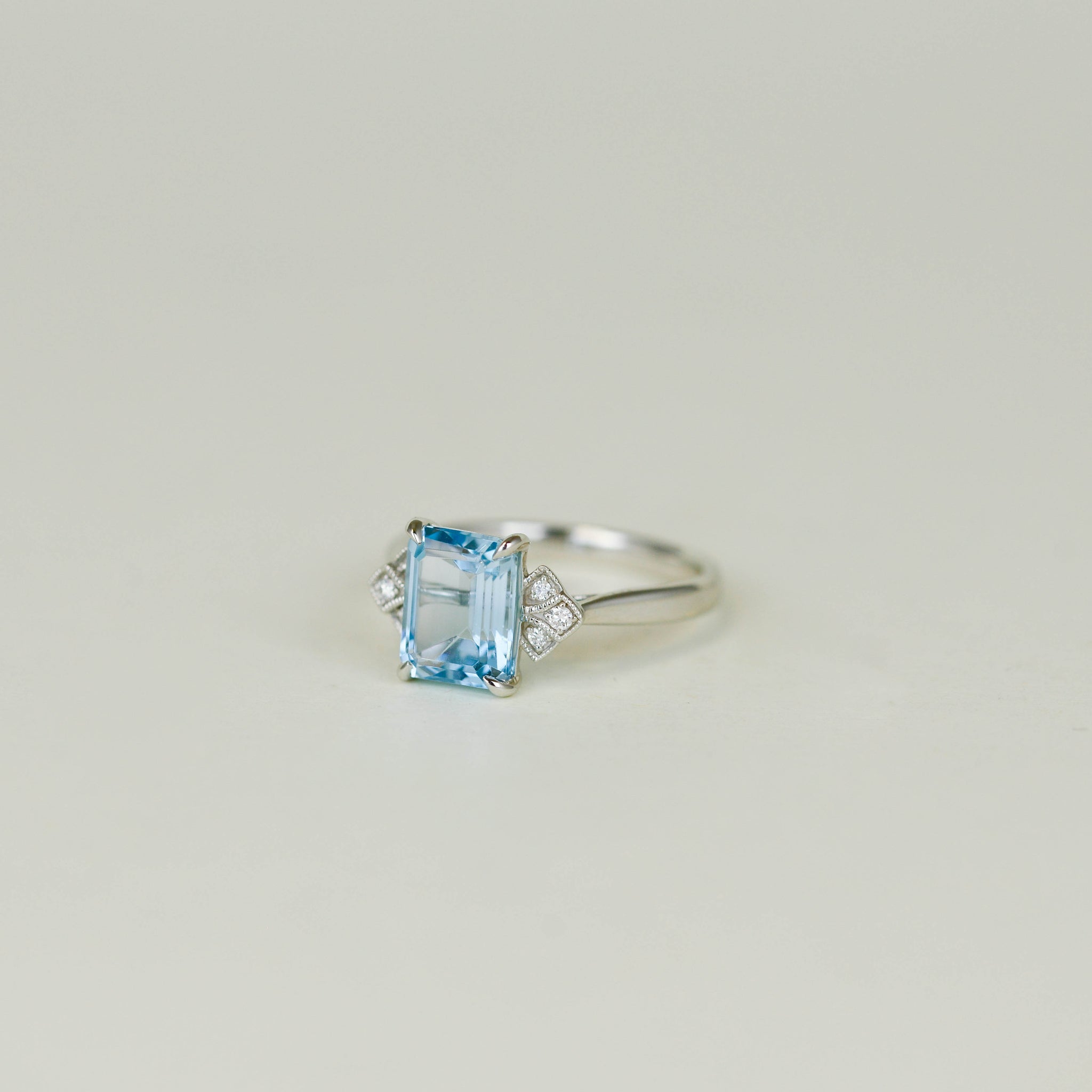 9ct White Gold 2.74ct Emerald Cut Blue Topaz and Diamond Dress Ring
