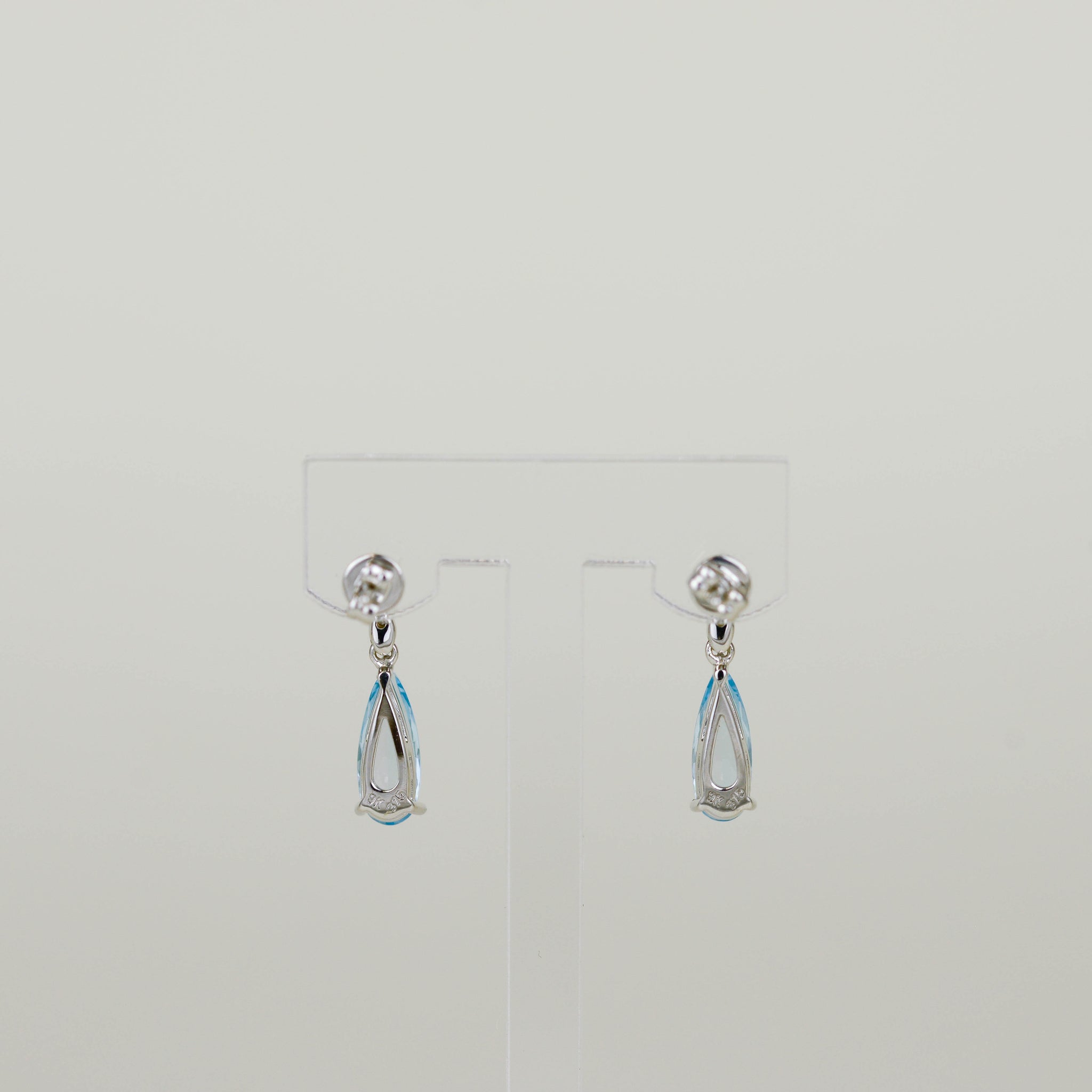 9ct White Gold 2.83ct Elongated Pear Cut Blue Topaz and Diamond Drop Earrings