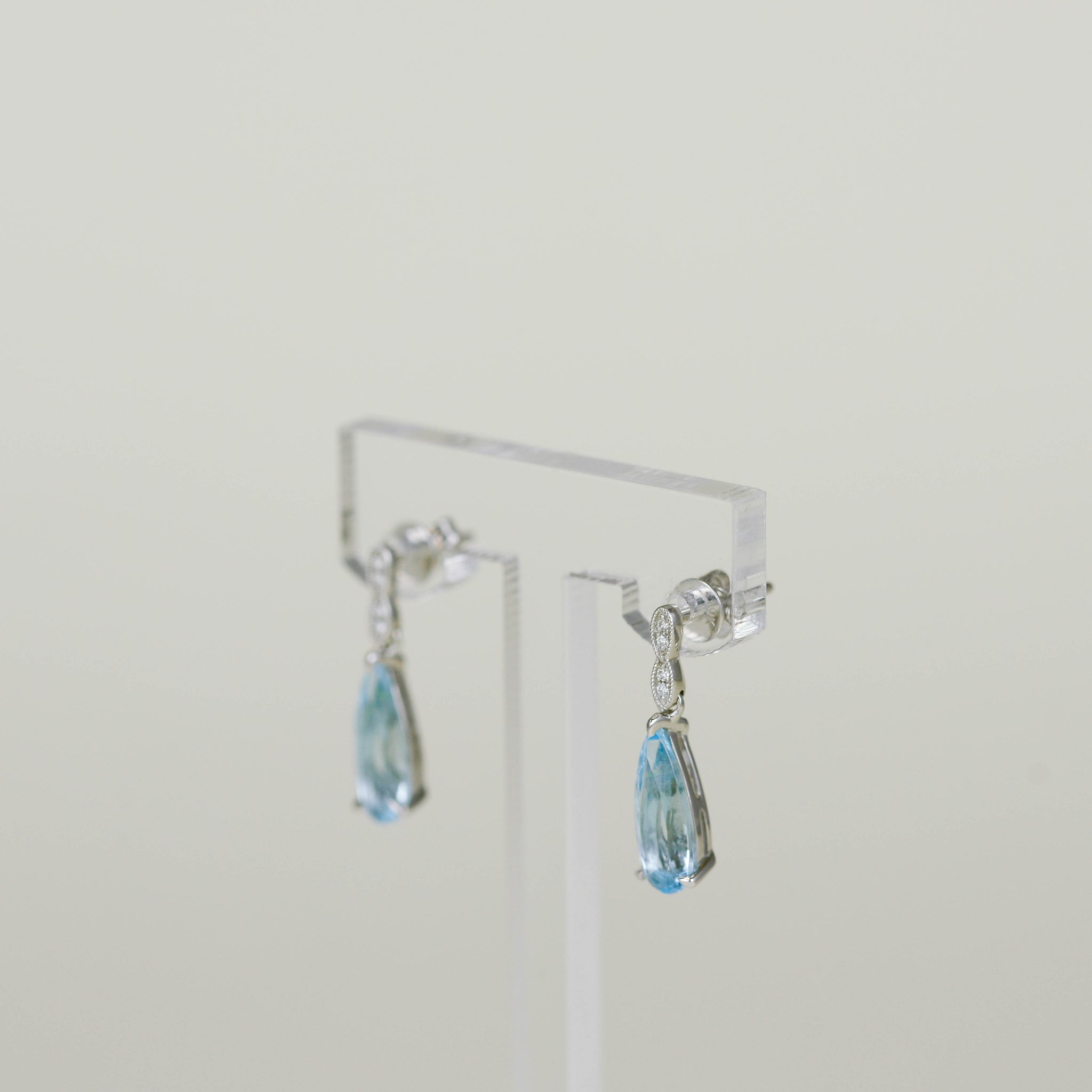 9ct White Gold 2.83ct Elongated Pear Cut Blue Topaz and Diamond Drop Earrings
