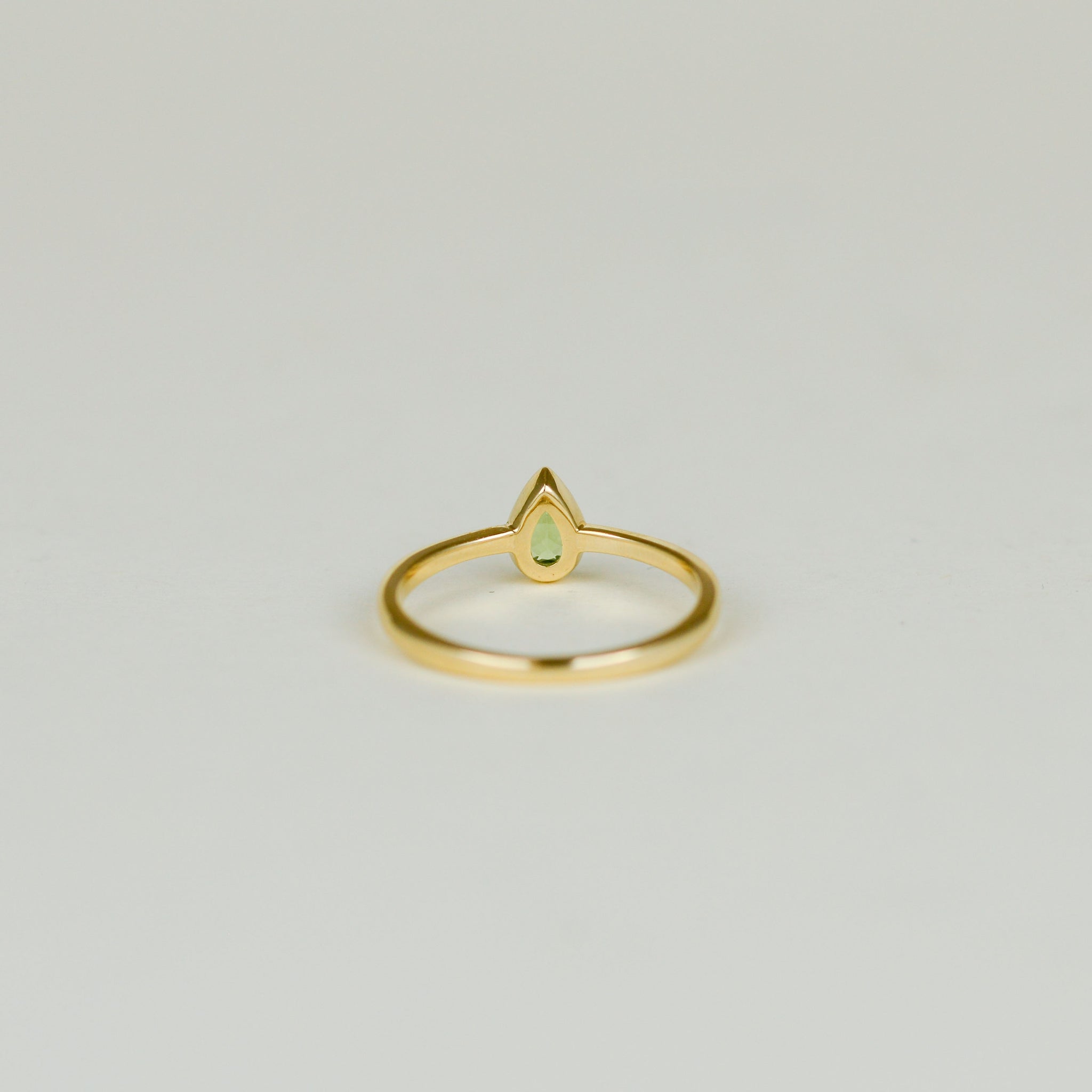 9ct Yellow Gold 0.24ct Pear Cut Rub Set Peridot Ring