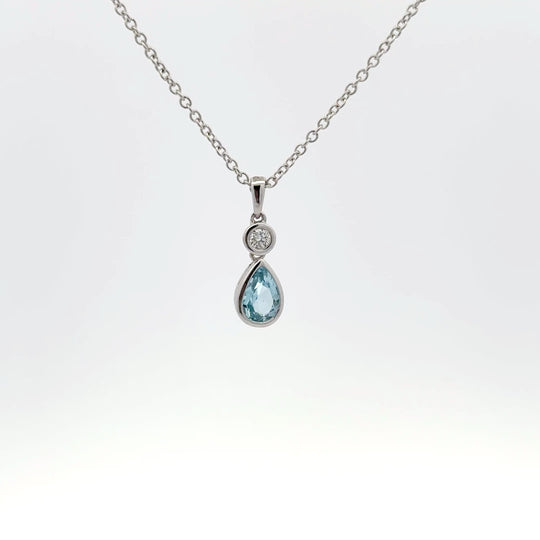 9ct White Gold 0.55ct Pear Cut Blue Topaz and Diamond Pendant