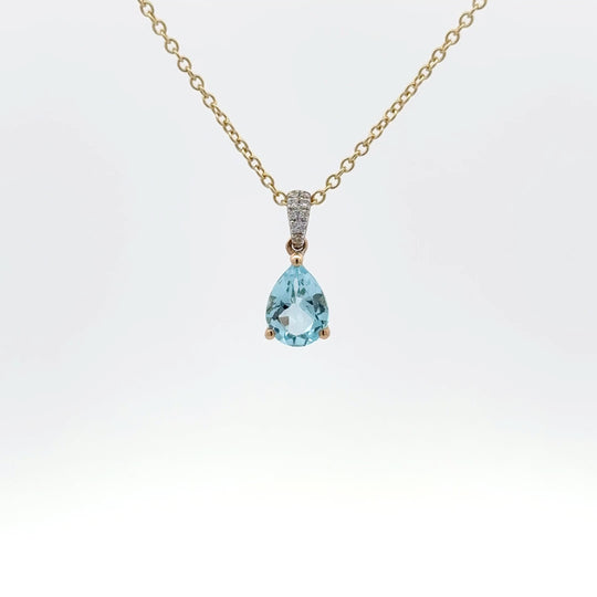 9ct Yellow Gold 1.17ct Pear Cut Blue Topaz and Diamond Pendant