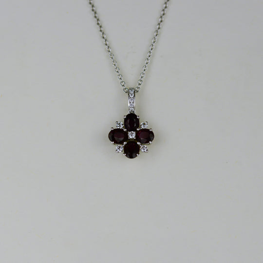 18ct White Gold 1.53ct Oval Ruby and Diamond Flower Pendant