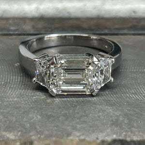 Emerald and Trapeze Cut Diamond Ring