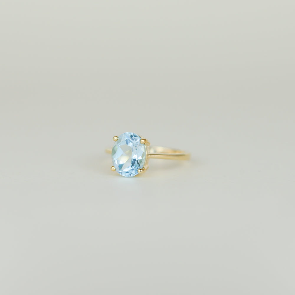 9ct Yellow Gold 3.23ct Oval Blue Topaz Ring