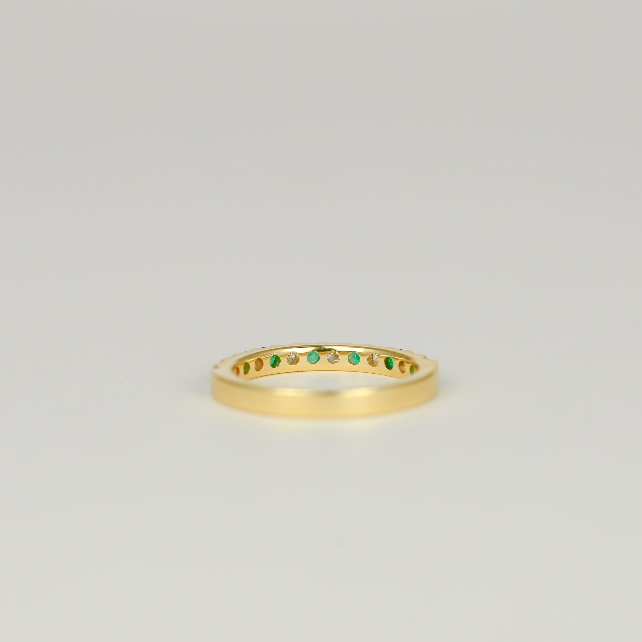 18ct Yellow Gold 0.29ct Castle Set Emerald and Diamond Half Eternity Ring