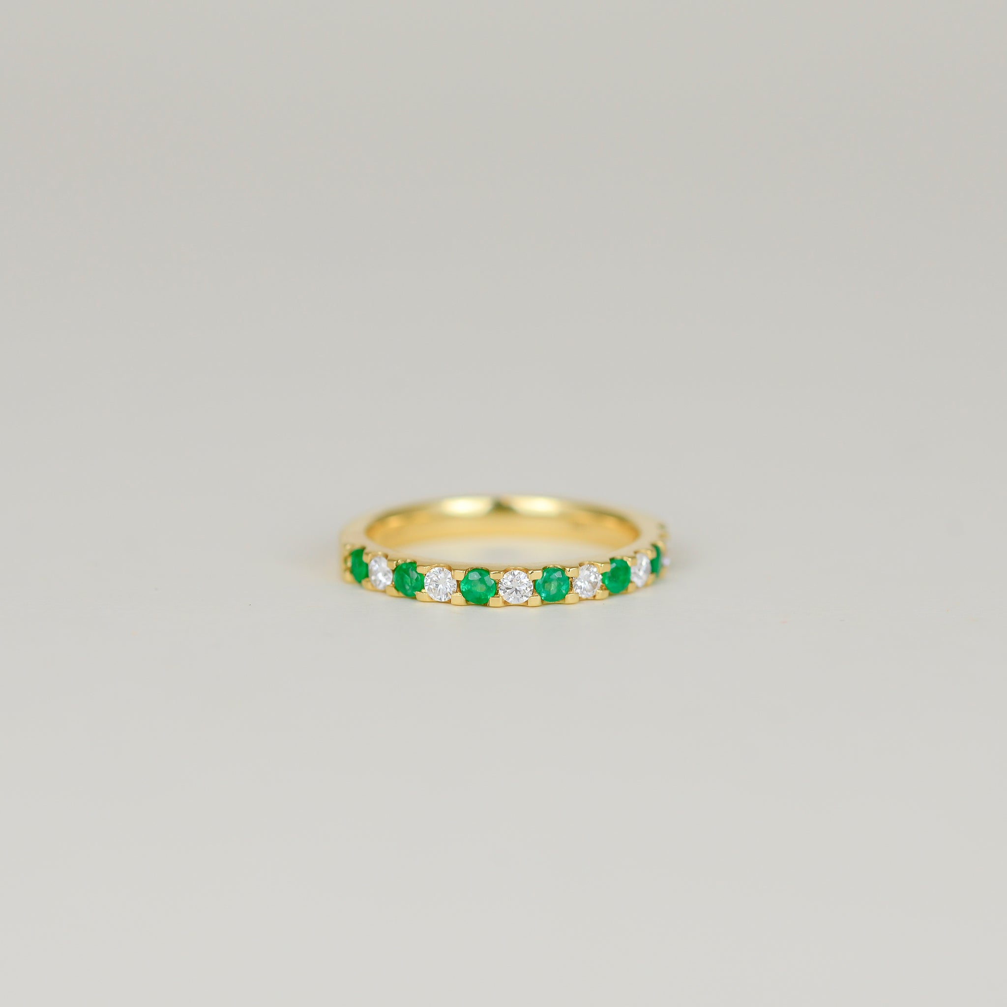 18ct Yellow Gold 0.29ct Castle Set Emerald and Diamond Half Eternity Ring
