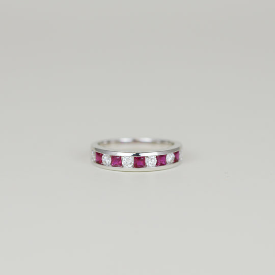 18ct White Gold 0.56ct Channel Set Ruby and Diamond Half Eternity Ring