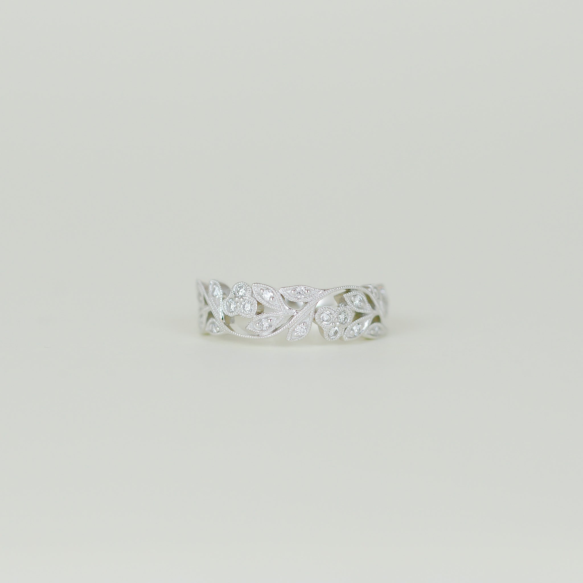 Platinum 0.22ct Diamond Leaf Motif Half Eternity Ring