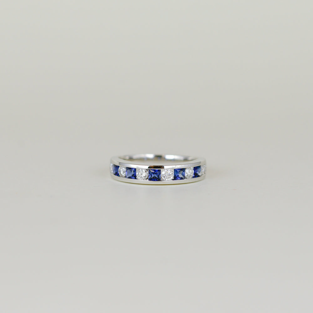 18ct White Gold 0.58ct Round Sapphire and Diamond Channel-Set Half Eternity Ring