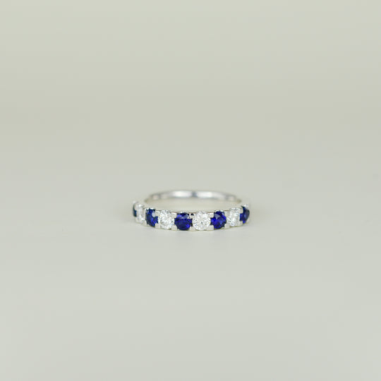 Platinum 0.65ct Round Sapphire and Diamond Half Eternity Ring