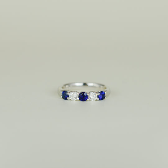 Platinum 0.61ct Round Sapphire and Diamond Half Eternity Ring