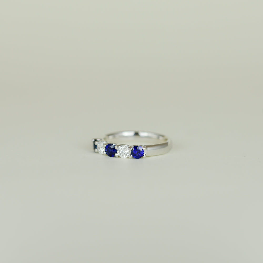 Platinum 0.61ct Round Sapphire and Diamond Half Eternity Ring