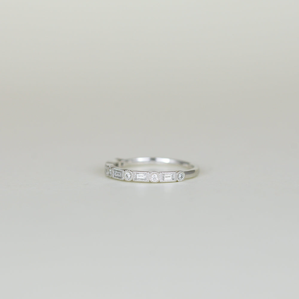 Platinum 0.27ct Baguette and Round Brilliant Diamond Eternity Ring