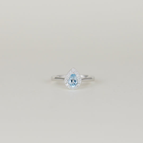 9ct White God 0.45ct Pear Blue Topaz and Diamond Cluster Ring