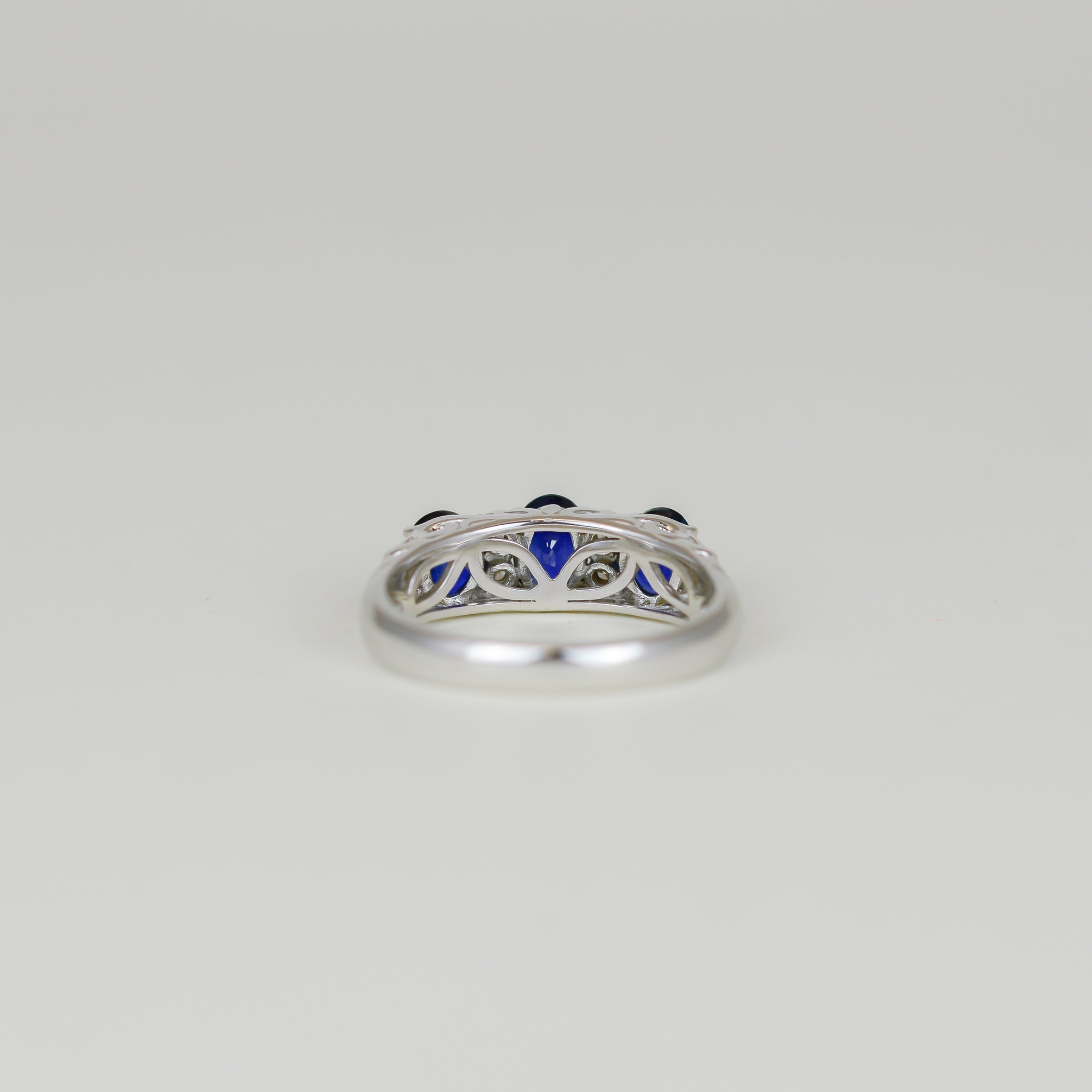 White Gold 1.62ct Oval Sapphire and Diamond Carved Claw Dress Ring