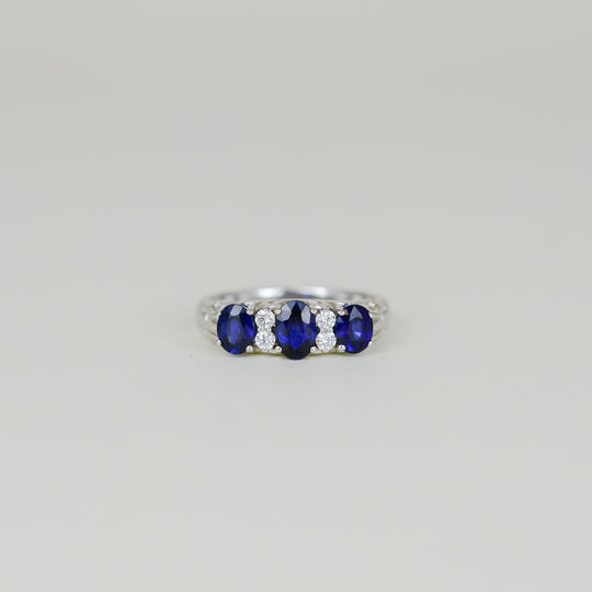 White Gold 1.62ct Oval Sapphire and Diamond Carved Claw Dress Ring