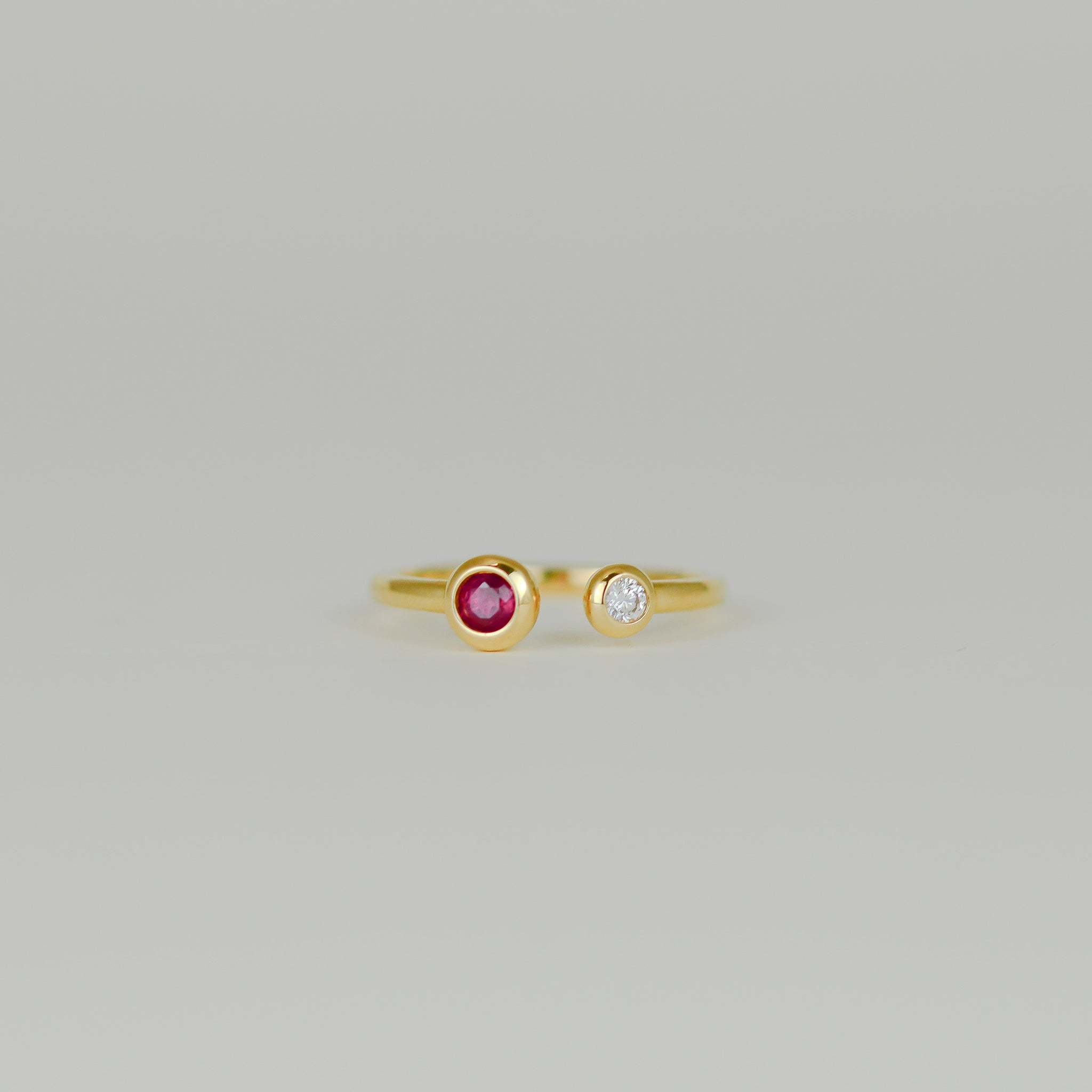 18ct Yellow Gold 0.22ct Round Ruby and Diamond Rub-Set Open Ring