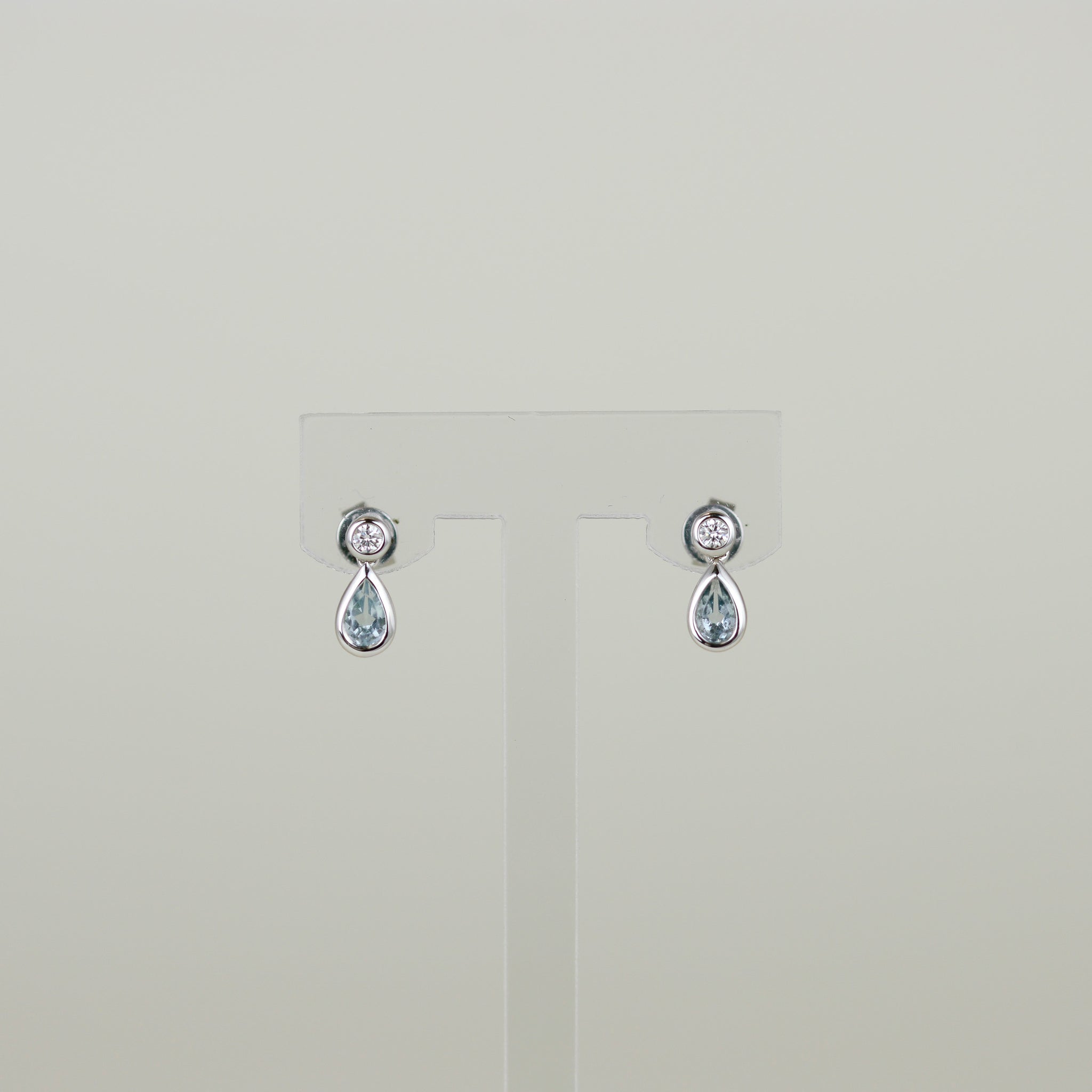 9ct White Gold 0.50ct Pear Cut Blue Topaz and Diamond Drop Stud Earrings