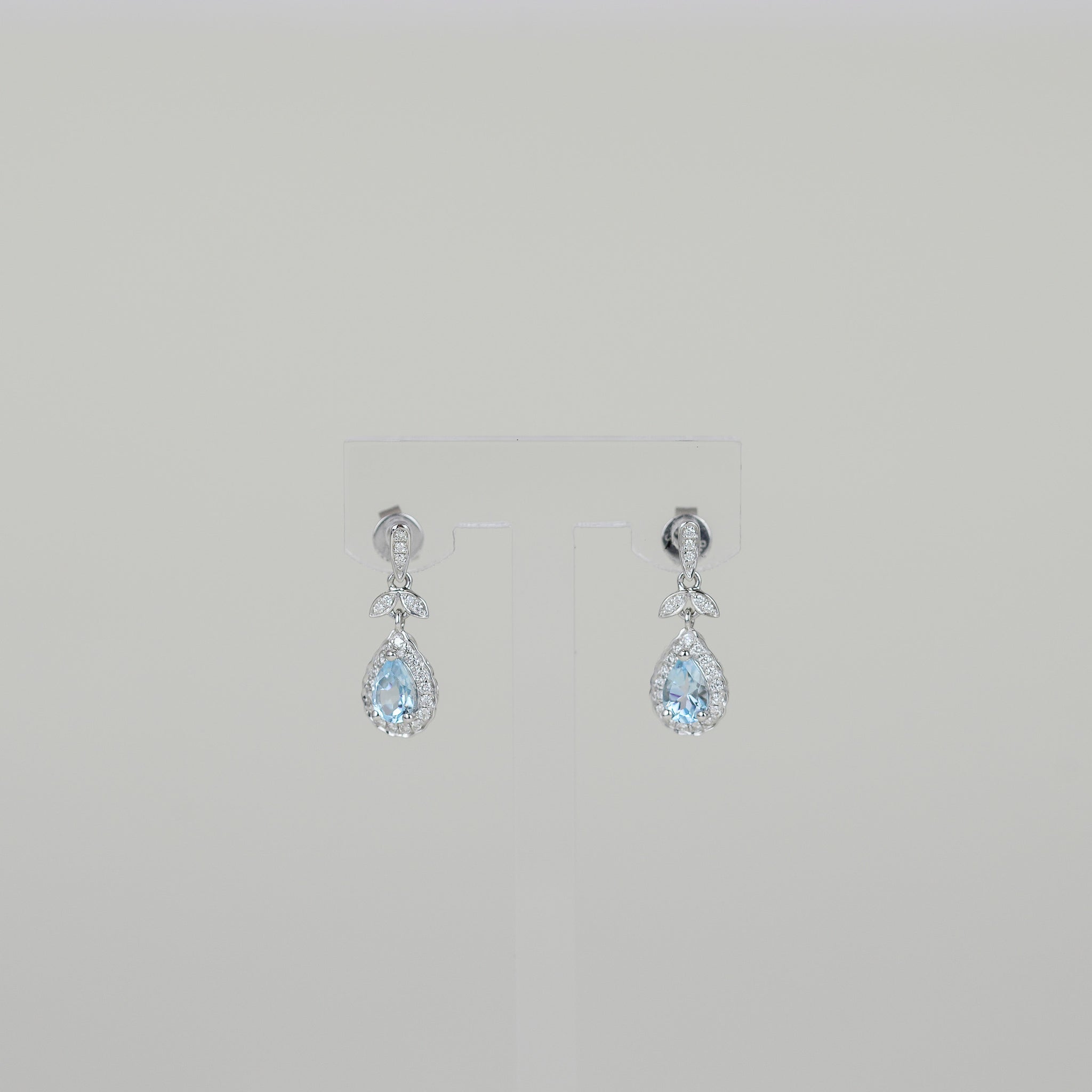 9ct White Gold Pear 1.00ct Blue Topaz and Diamond Drop Earrings