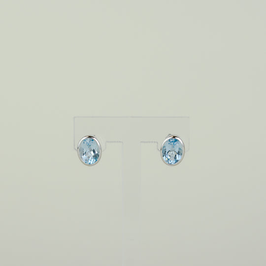 9ct White Gold 3.14ct Oval Rub-Set Blue Topaz Earrings