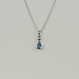 18ct White Gold 0.48ct Pear Cut Blue Topaz and Diamond Pendant