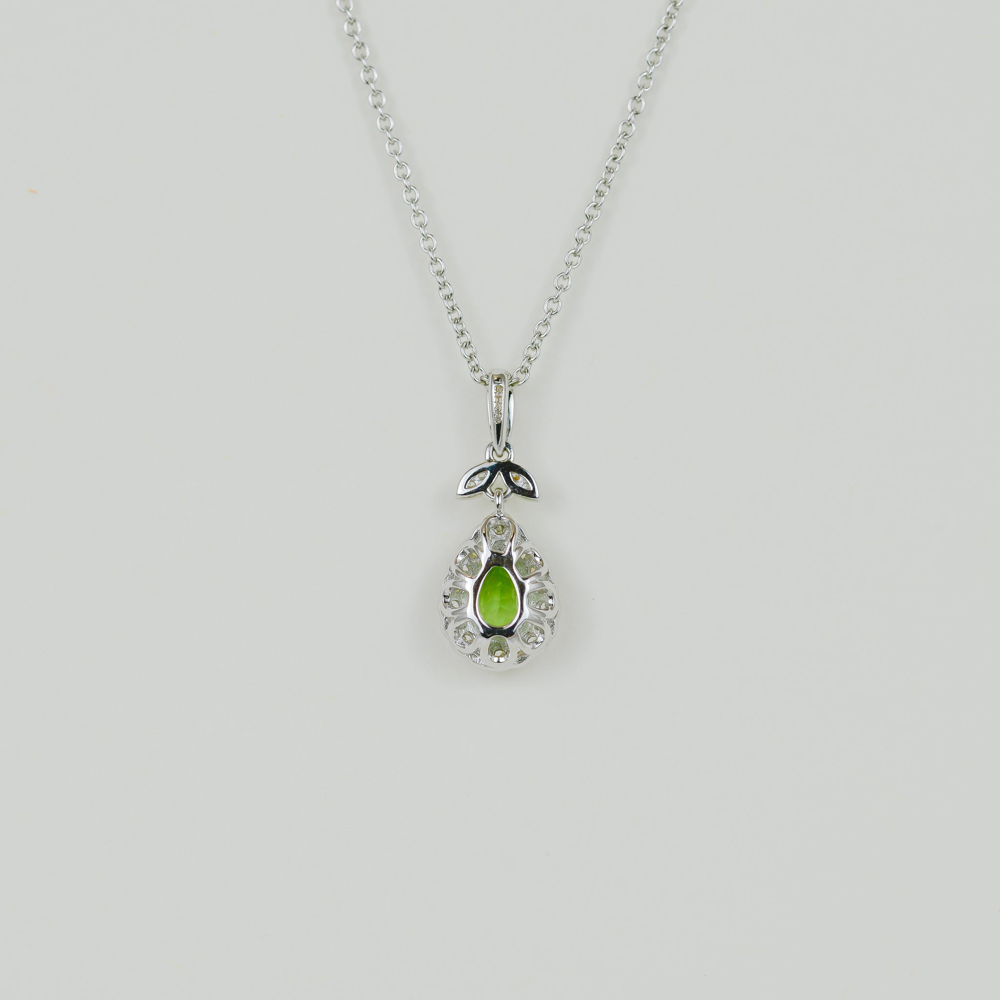 9ct White Gold 0.83ct Pear Peridot and Diamond Floral Pendant