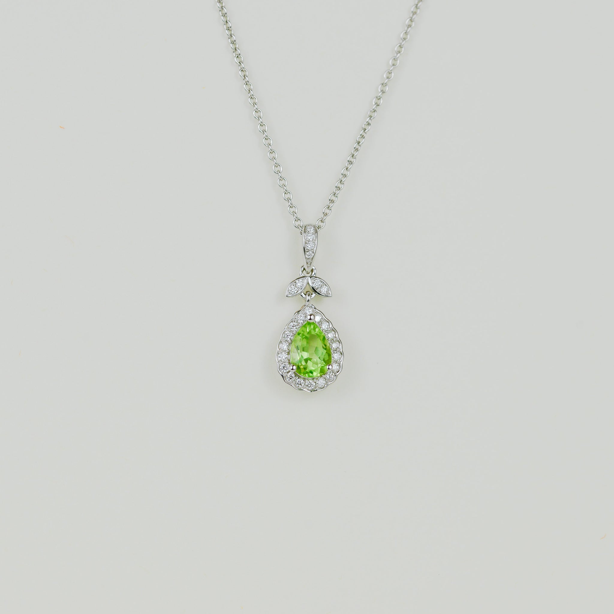 9ct White Gold 0.83ct Pear Peridot and Diamond Floral Pendant