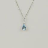 18ct White Gold 1.21ct Pear Cut Blue Topaz and Diamond Pendant