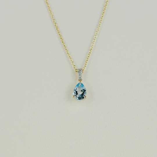 9ct Yellow Gold 1.33ct Pear Cut Blue Topaz and Diamond Pendant