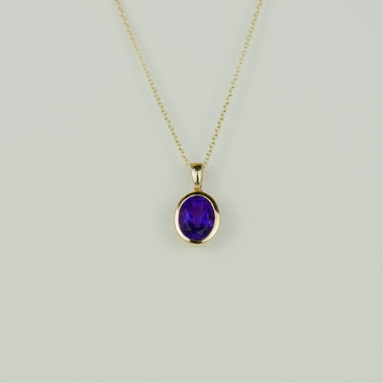 9ct Yellow Gold 2.58ct Oval Rub-Set Amethyst Pendant