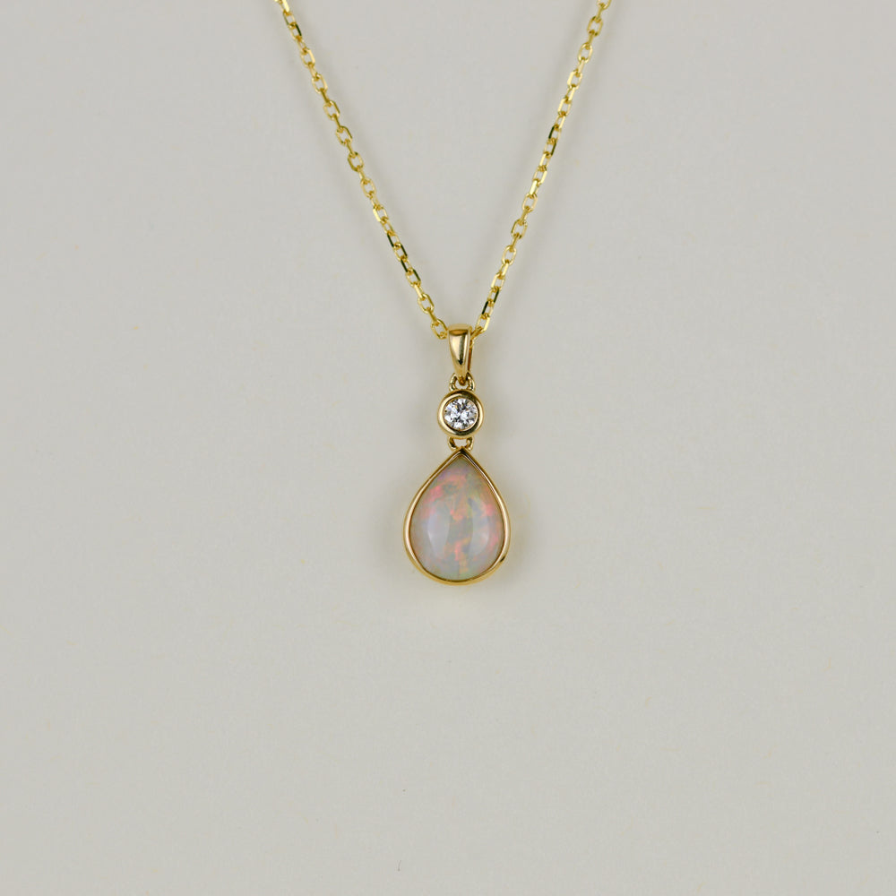 9ct Yellow Gold 0.84ct Pear Cut Opal and Diamond Pendant