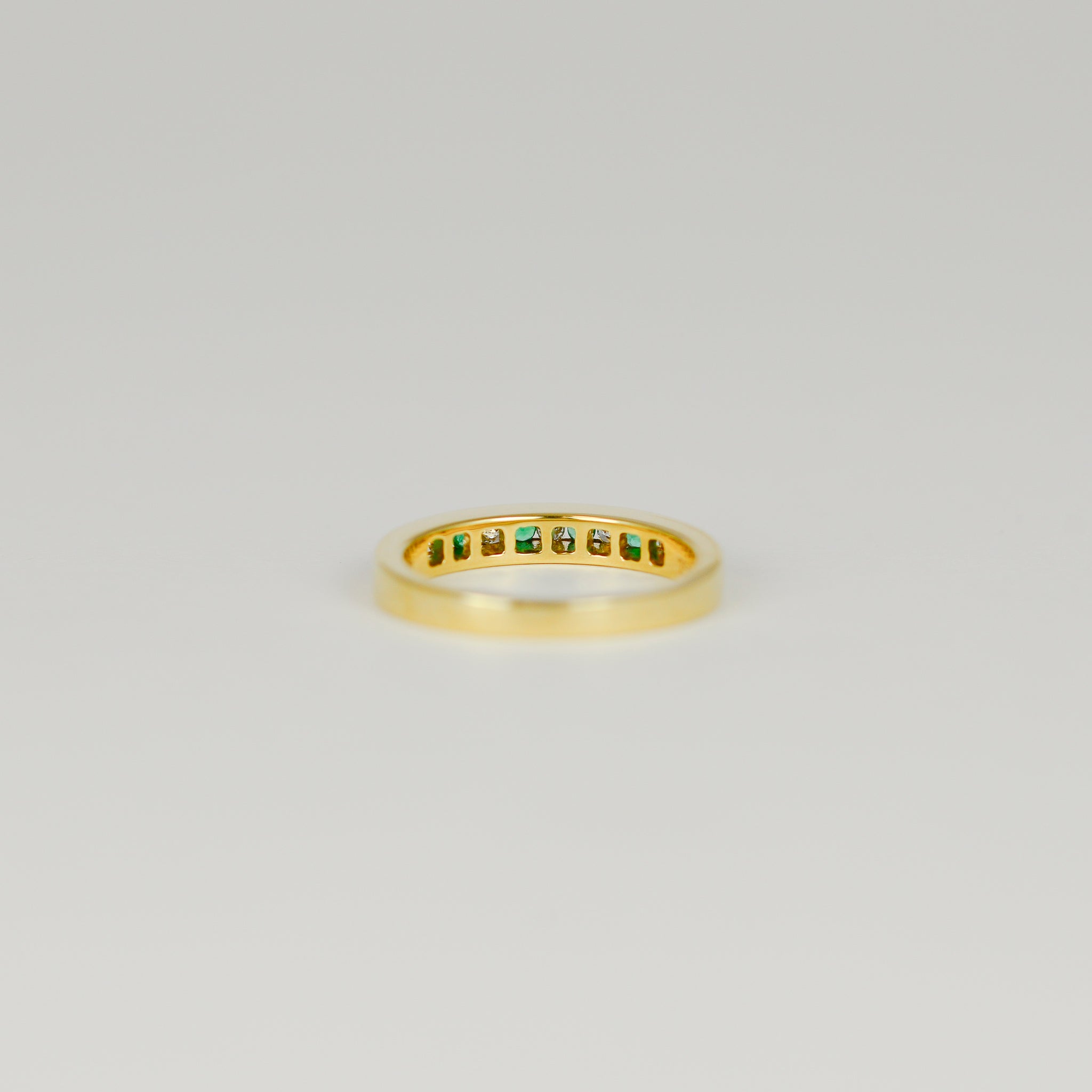 18ct Yellow Gold 0.12ct Rub Set Emerald and Diamond Half Eternity Ring