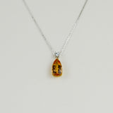 18ct Yellow & White Gold 4.61ct Pear Cut Imperial Topaz and 0.16ct Diamond Pendant