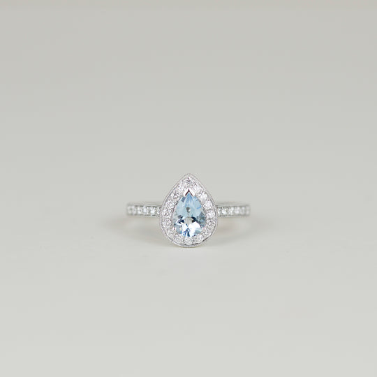18ct White Gold 0.60ct Pear Aquamarine and 0.33ct Diamond Halo Ring