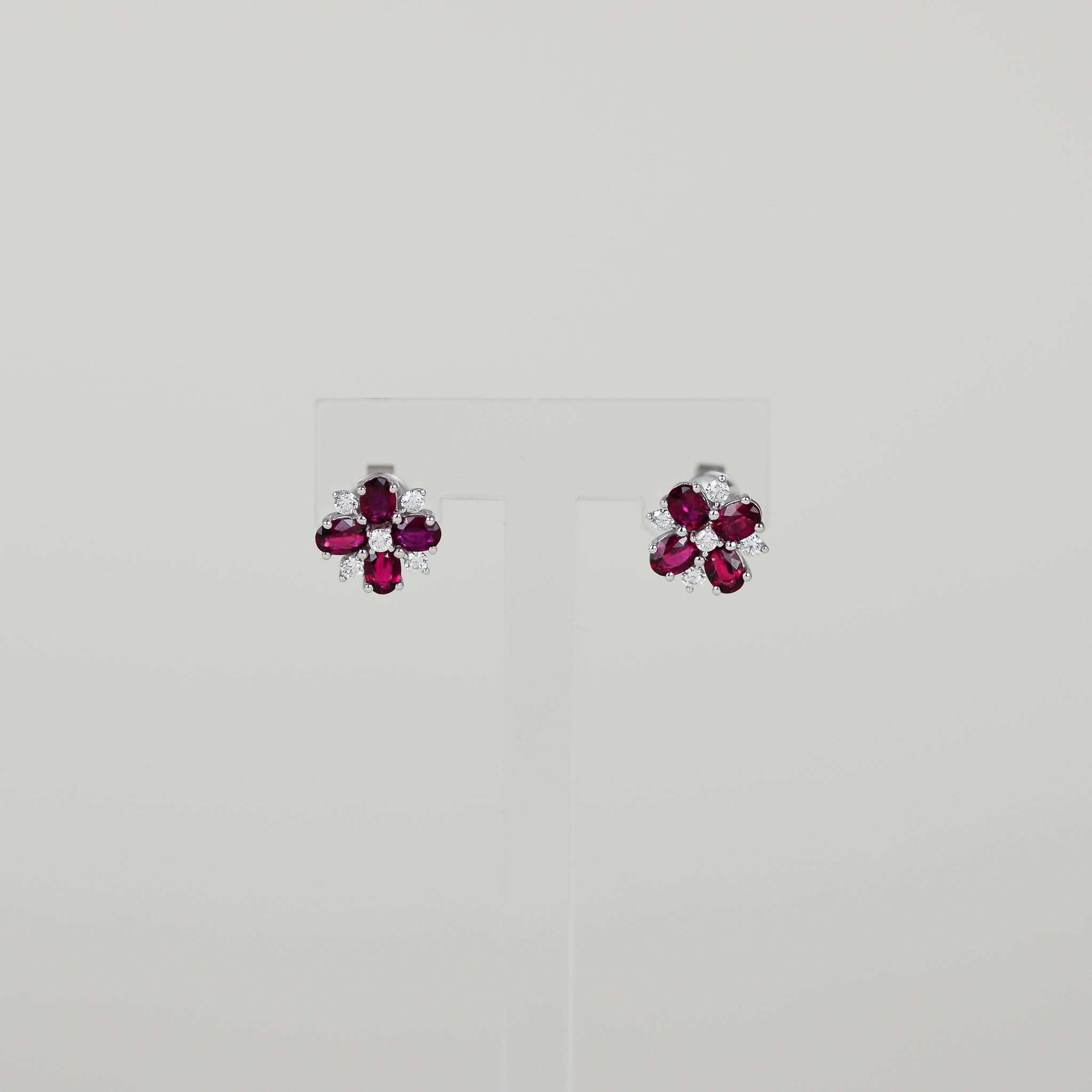 18ct White Gold 1.47ct Oval Ruby and Diamond Cluster Stud Earrings