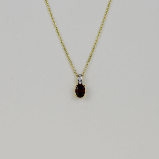 18ct Yellow Gold 1.12ct Oval Garnet and Diamond Pendant