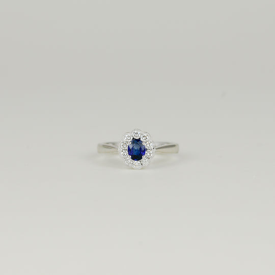 18ct White Gold 0.53ct Oval Sapphire and Diamond Cluster Ring
