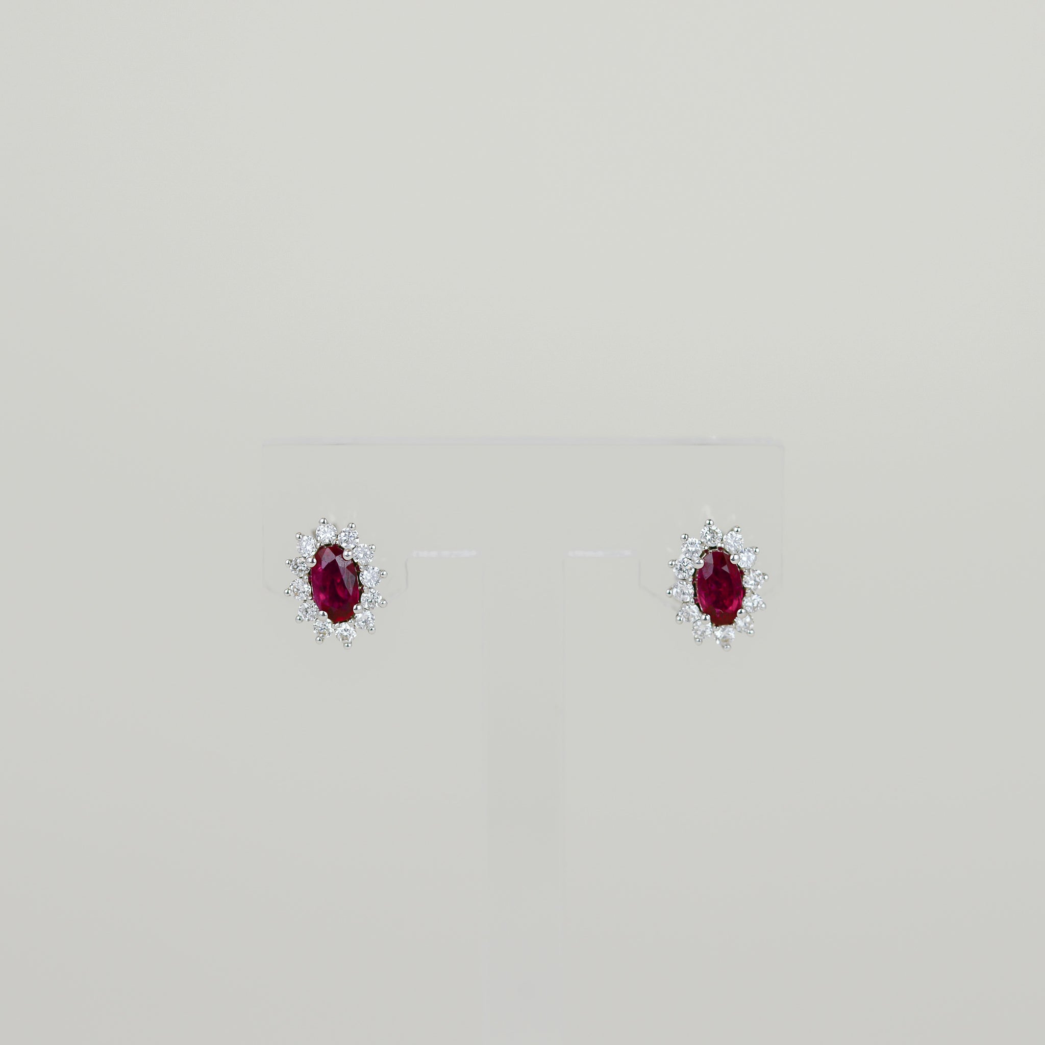 9ct White Gold 0.55ct Oval Ruby and Diamond Cluster Earrings