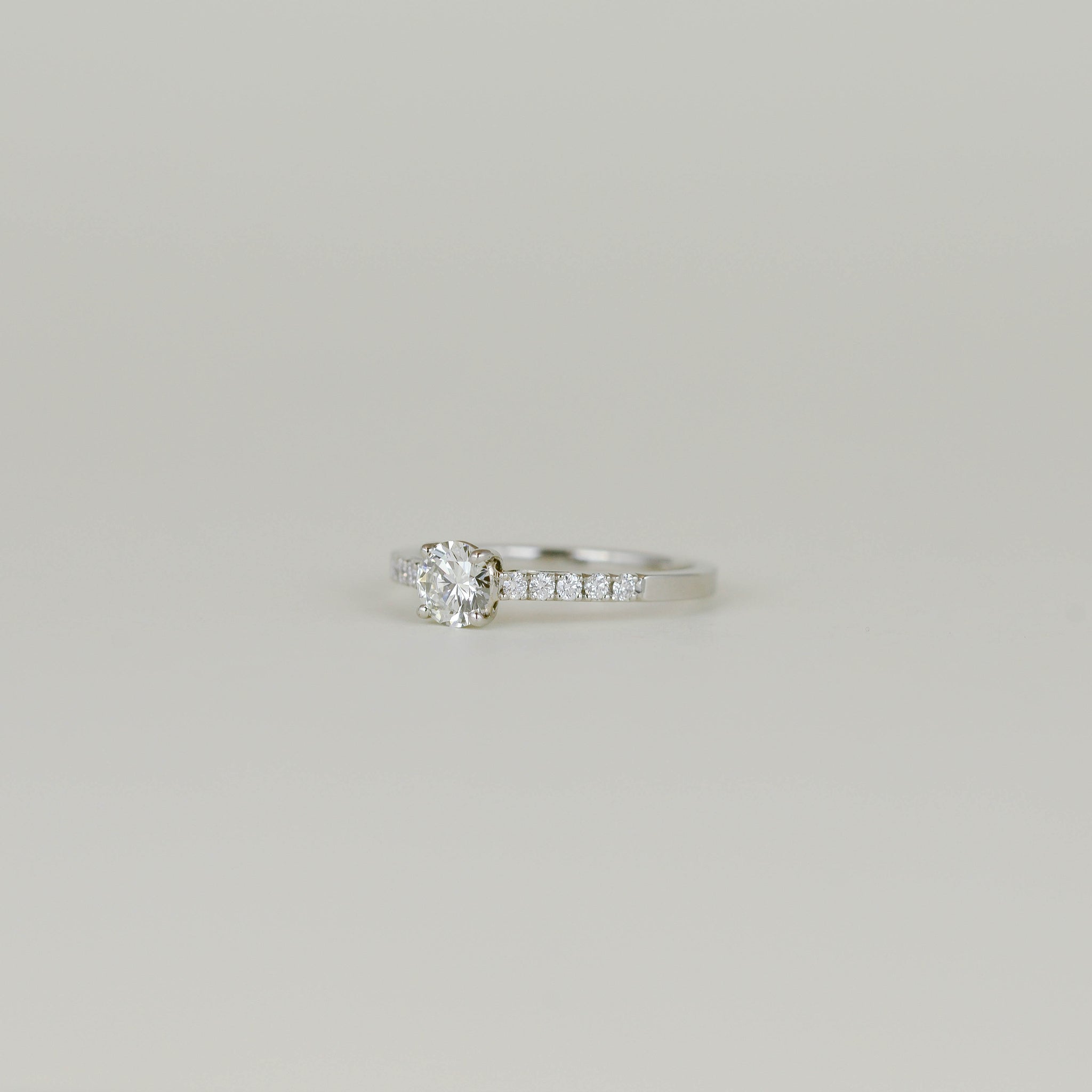 Platinum 0.51ct Diamond Solitaire with Diamond Set Shoulders Ring
